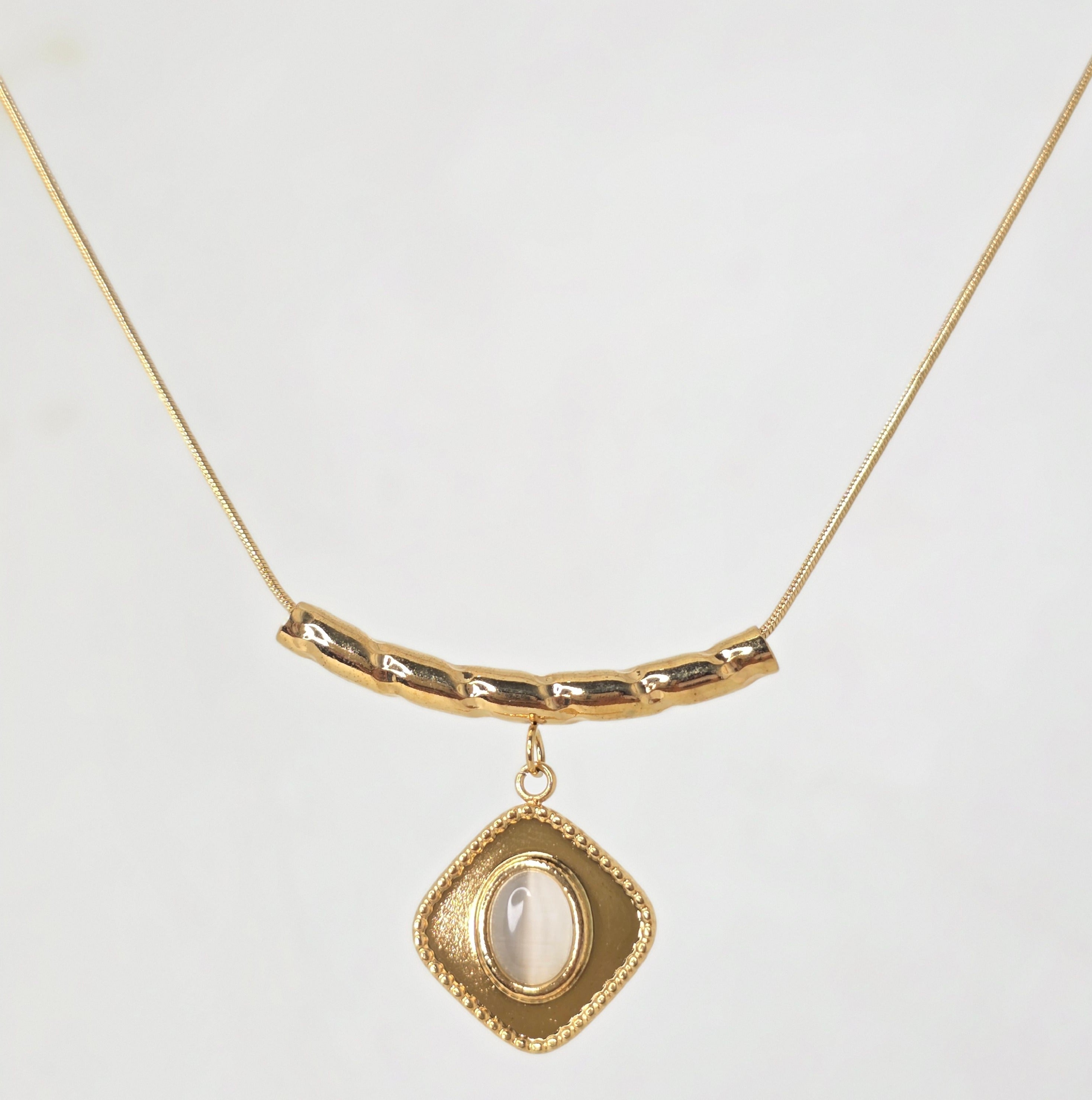 Gold Necklace with a stone pendant